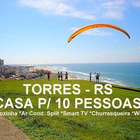 Casa De 2 Quartos Com 2 Ares-Condicionados Em Torres-Rs - Na Mais Bela Praia Gaucha - Cozinha - Banheiro - Tv Smart 32 E Wi-Fi - Estacionamento - Anfitria Superhost No Bnb Villa Eksteriør bilde