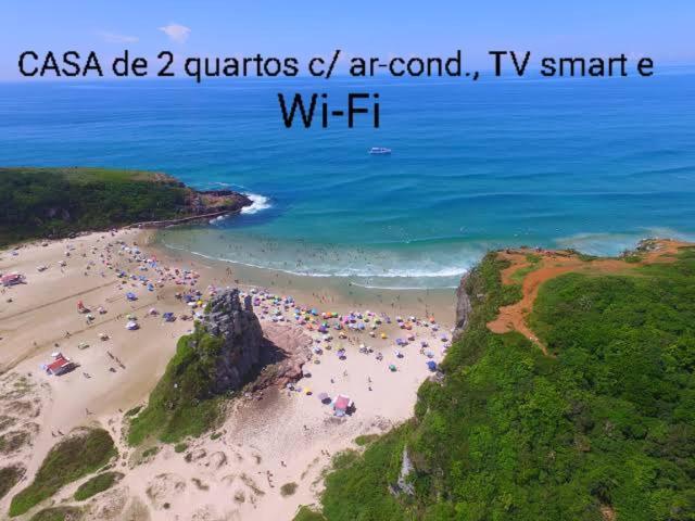 Casa De 2 Quartos Com 2 Ares-Condicionados Em Torres-Rs - Na Mais Bela Praia Gaucha - Cozinha - Banheiro - Tv Smart 32 E Wi-Fi - Estacionamento - Anfitria Superhost No Bnb Villa Eksteriør bilde